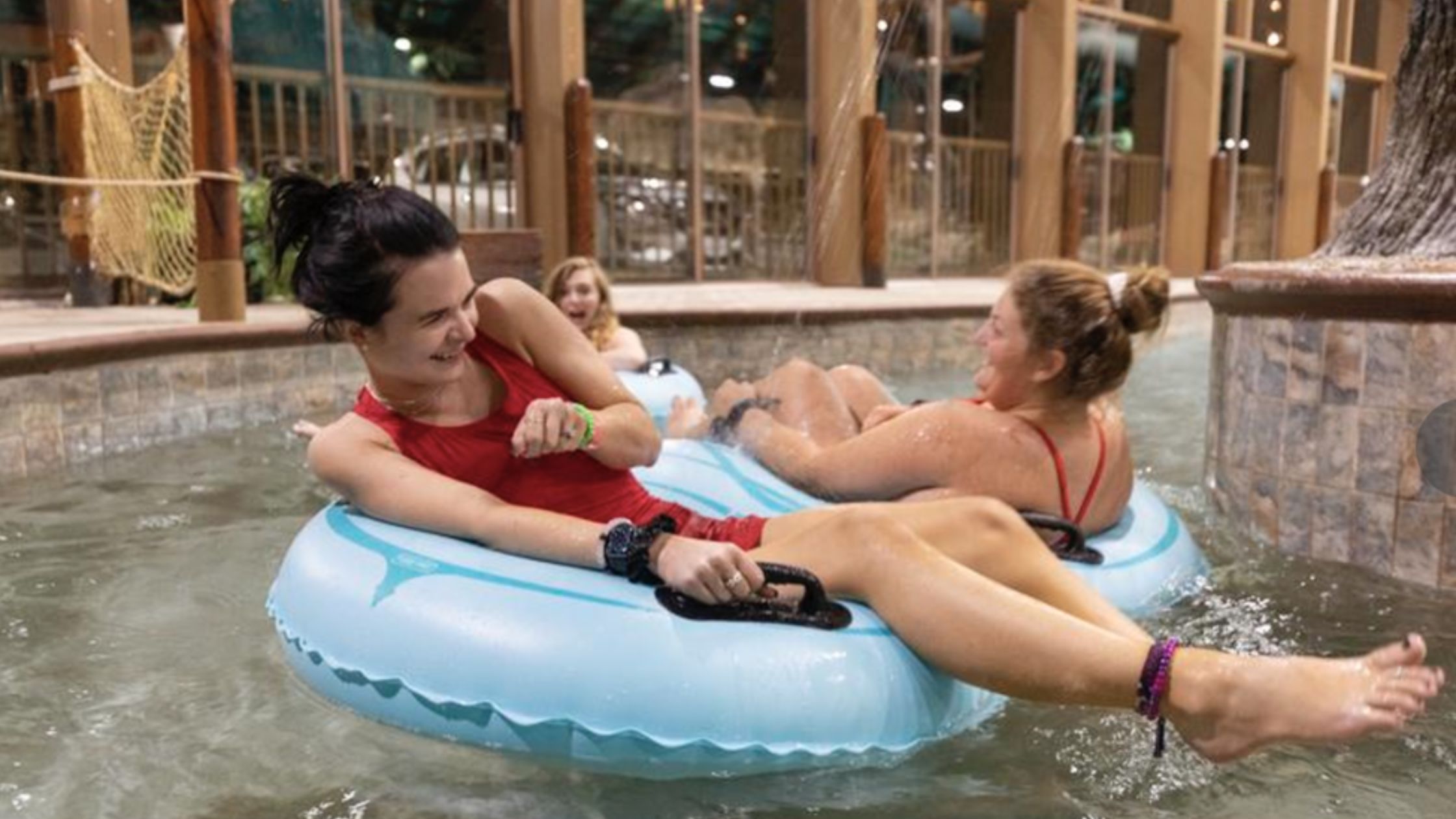 people on water rafts at wild bear falls water park