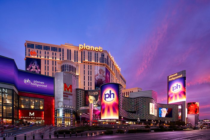 exterior view of planet hollywood resort in vegas at night