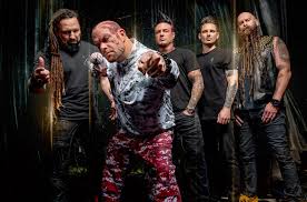 one of the best rock concert in las vegas featuring five finger death punch band members posing for a photo